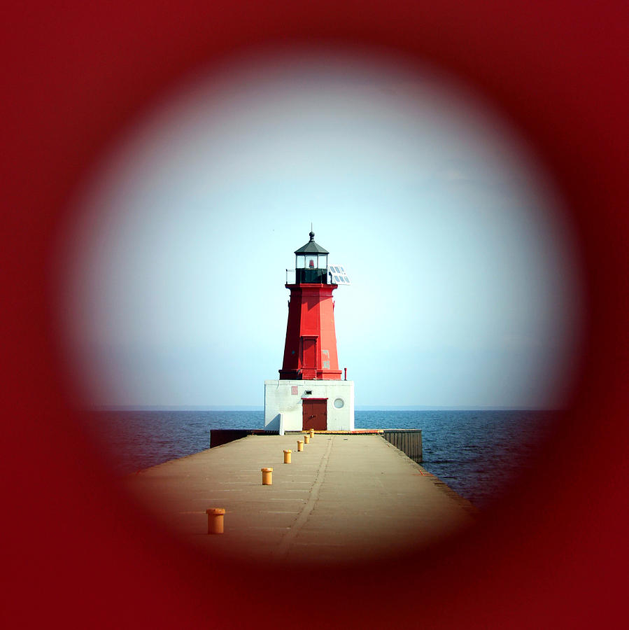 Menominee Lighthouse through a Rivet Hole Photograph by Mark J Seefeldt