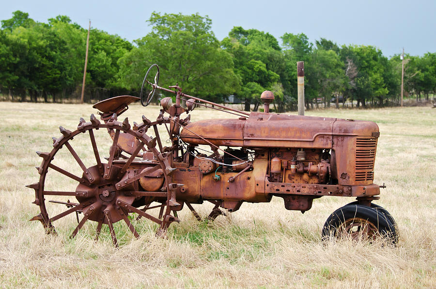Farm Photograph - Metal Wheeled Farmall by Lisa Moore