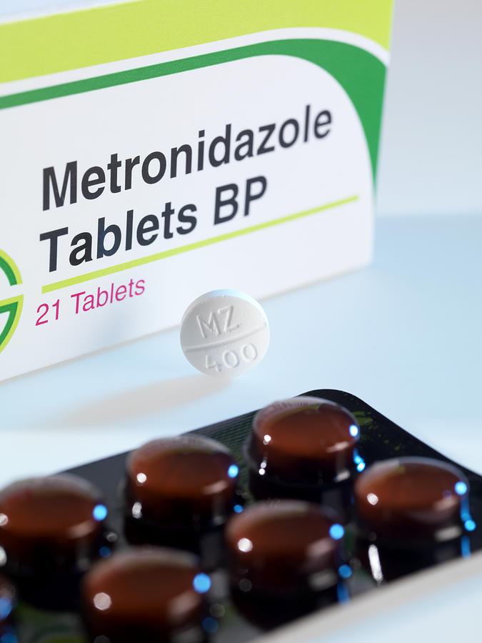 Still Life Photograph - Metronidazole Antibiotic Pills by Tek Image