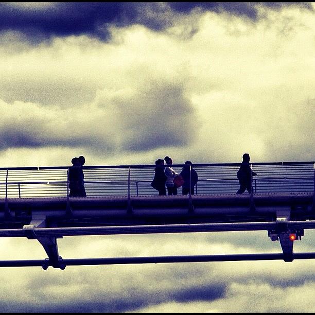 London Photograph - Millennium Bridge : Walking With Clouds by Neil Andrews