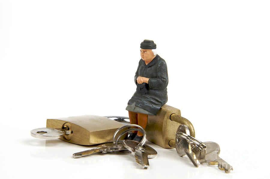 Miniature figurines of elderly sitting on padlocks by Bernard Jaubert