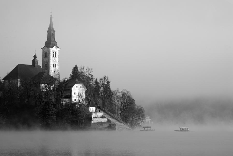 Misty Lake Bled in Black and White Photograph by Ian Middleton