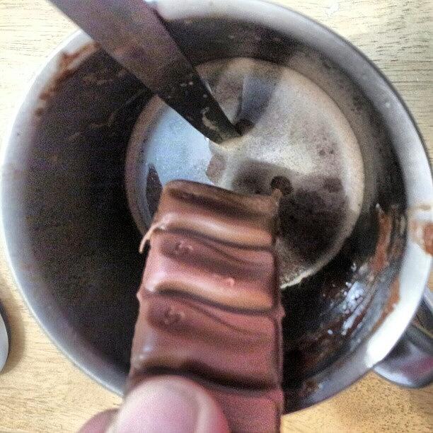 Mmm M Dipping Galaxy Chocolate In 100% Photograph by Stephen Shaw