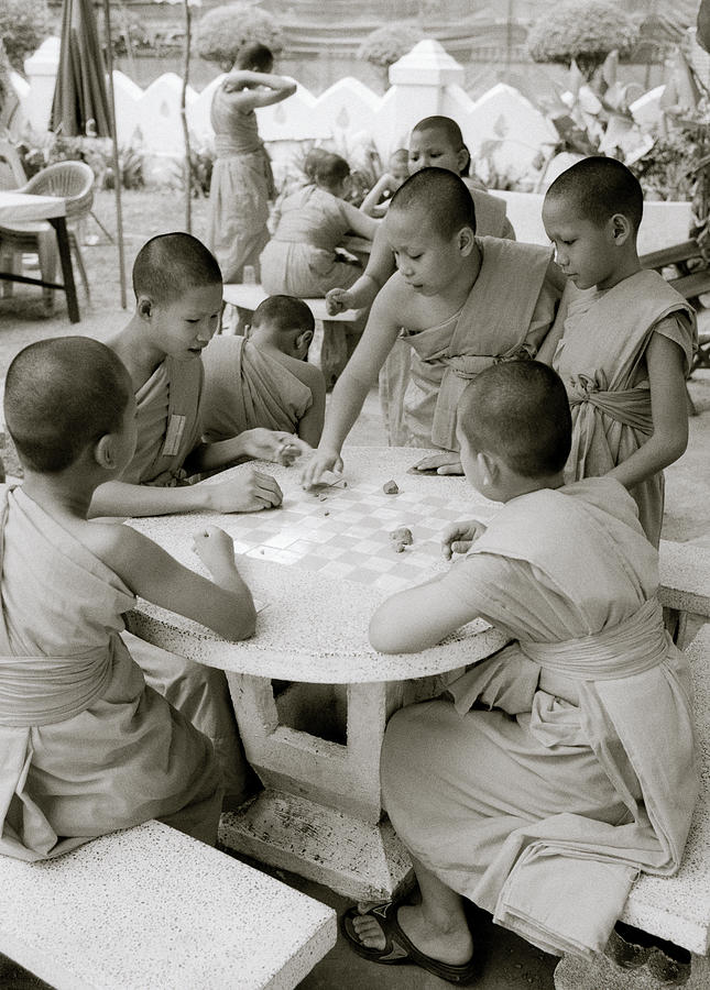 Novice Monks At Play Photograph by Shaun Higson