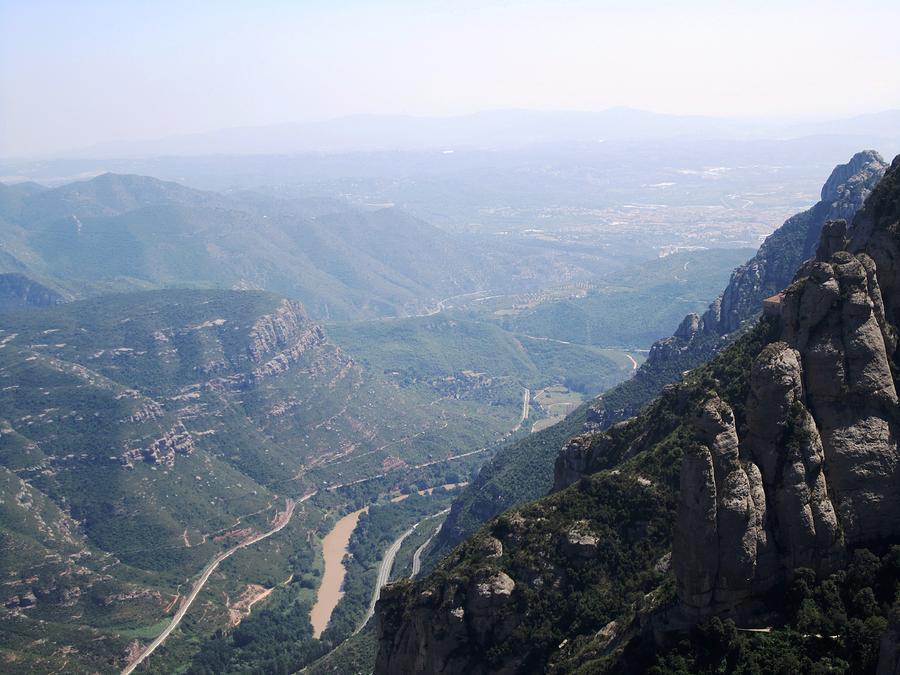 Montserrat View As Far As Eye Can See in A Hazy Day At High Altitude in Spain Near Barcelona Photograph by John Shiron