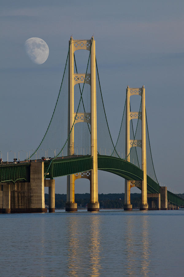 Moon and the Mackinaw Bridge by the Straits of Mackinac Photograph by Randall Nyhof