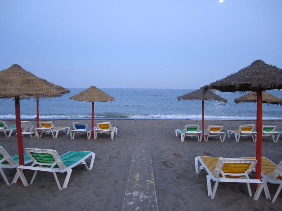 Moon Lit Beach Umbrellas and Chairs Costa Del Sol Spain Photograph by John Shiron