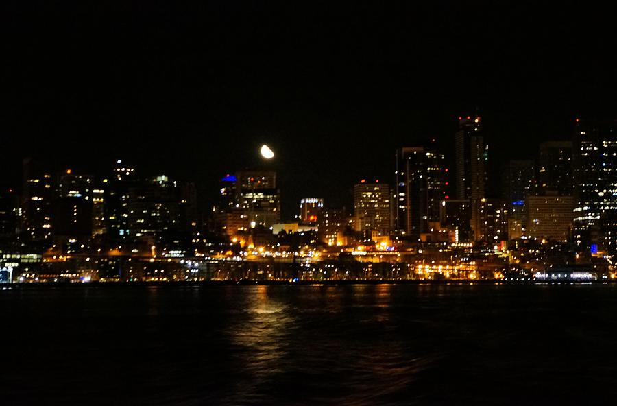 Moon Rises over Seattle Photograph by Ronda Broatch