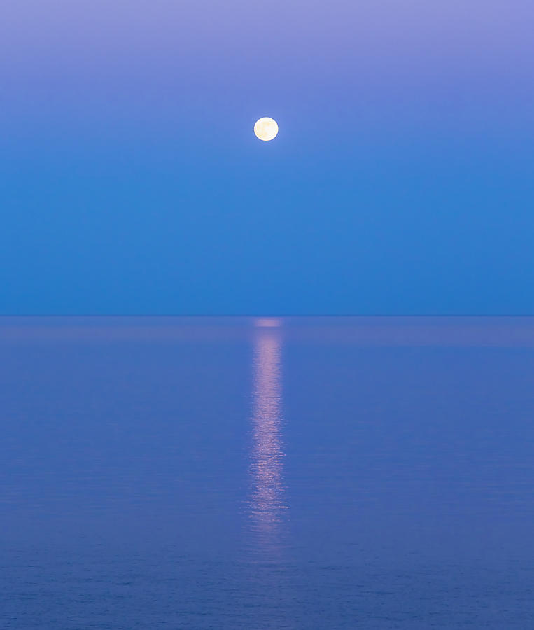 Moonrise Reflecting In The Sea Photograph by Ken Welsh