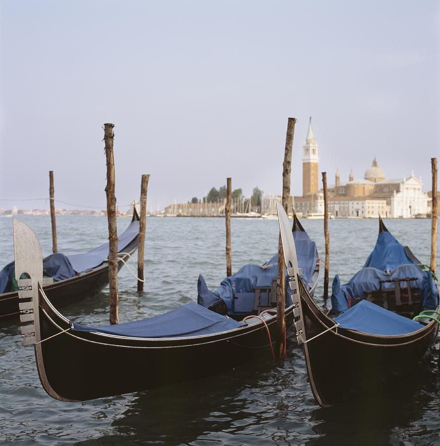 Boat Photograph - Moored Gondolas On Canal By St Mark  S by Axiom Photographic