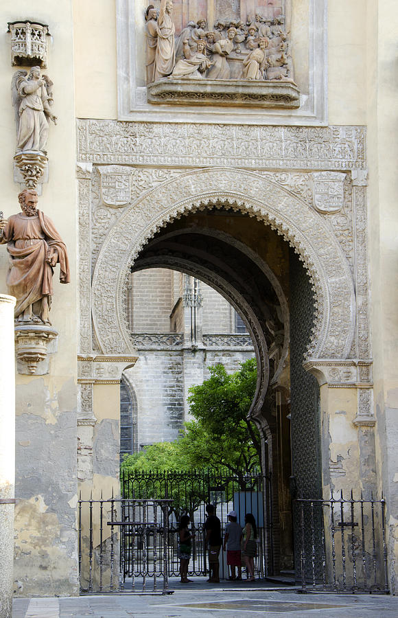 Moorish Photograph - Moorish Arch of the Giralda in Seville by Perry Van Munster