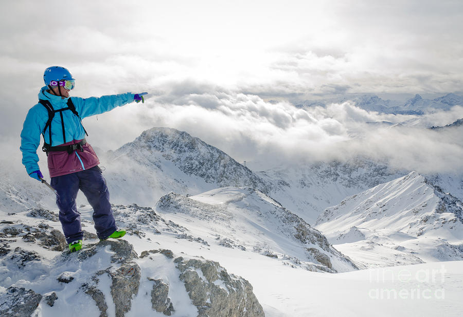 Mountain Photograph - MOUNTAIN GUIDE snowboard instructor pointing out peaks in Davos by Andy Smy