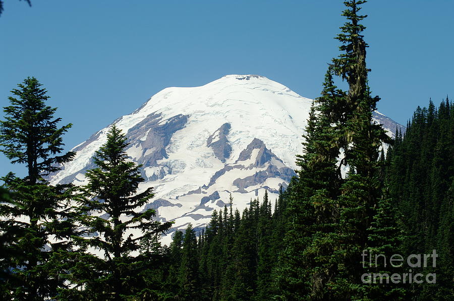 Mt Rainer Looming In The Distance Photograph by Jeff Swan - Fine Art ...