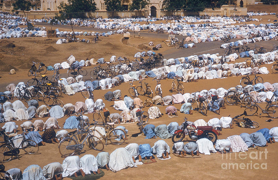 Muslims Pray Before Mosque Photograph by Photo Researchers, Inc.