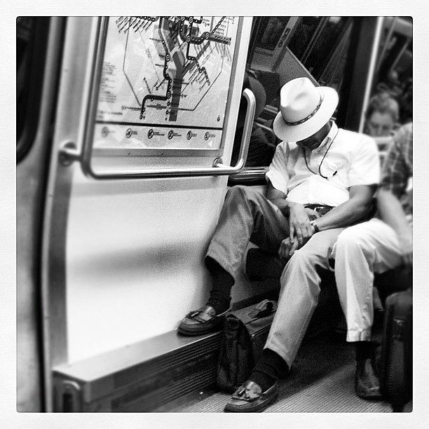 Hat Photograph - Naptime On The Metro by Rob Murray