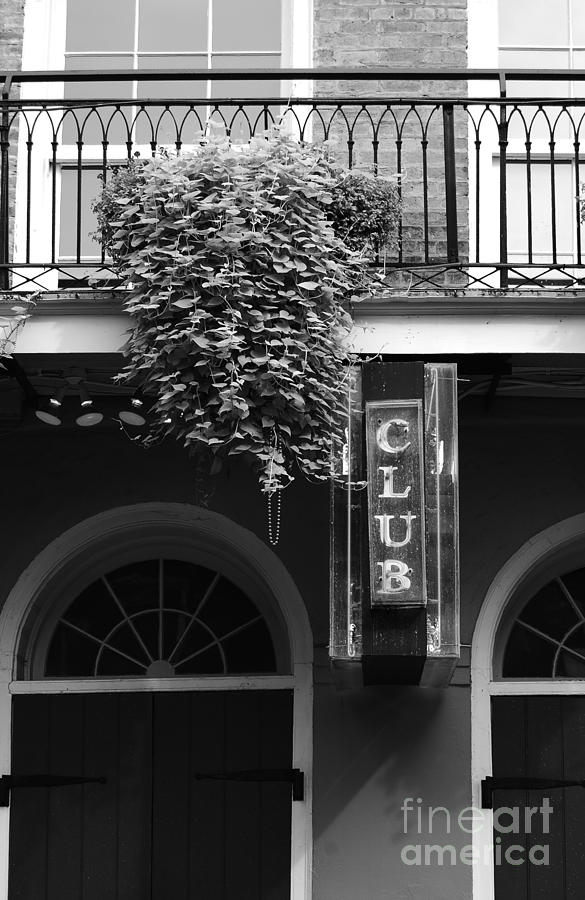 Neon Club Sign Bourbon Street Corner French Quarter New Orleans Black and White Photograph by Shawn OBrien