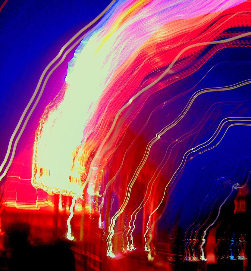 Neon in flight Photograph by Donna Spadola