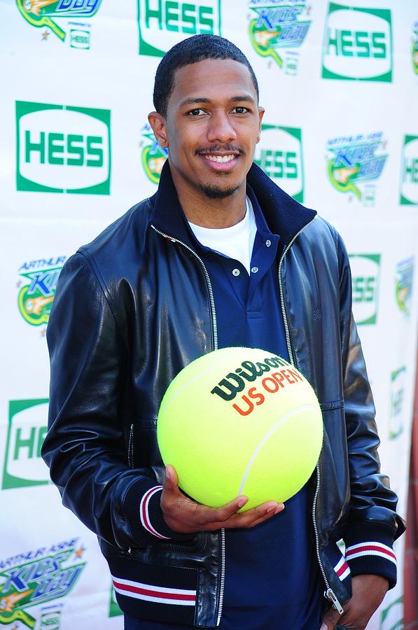 Portrait Photograph - Nick Cannon At A Public Appearance by Everett