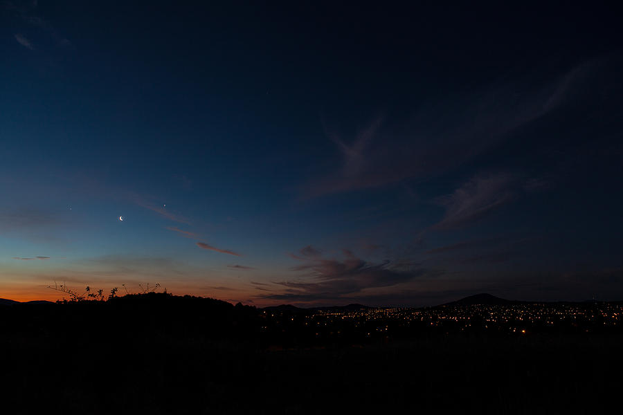 Sunset Photograph - Night Meets Day by Brendan Maunder
