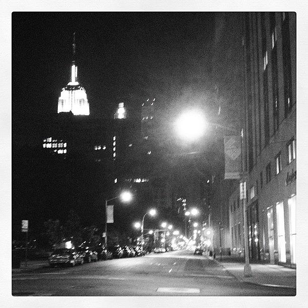 Empire State Building Photograph - Night walk down 23rd st. by Elroy Byam