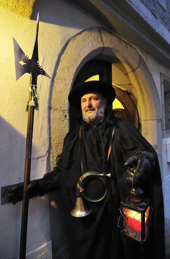 Night watchman in old historic town Photograph by Matthias Hauser