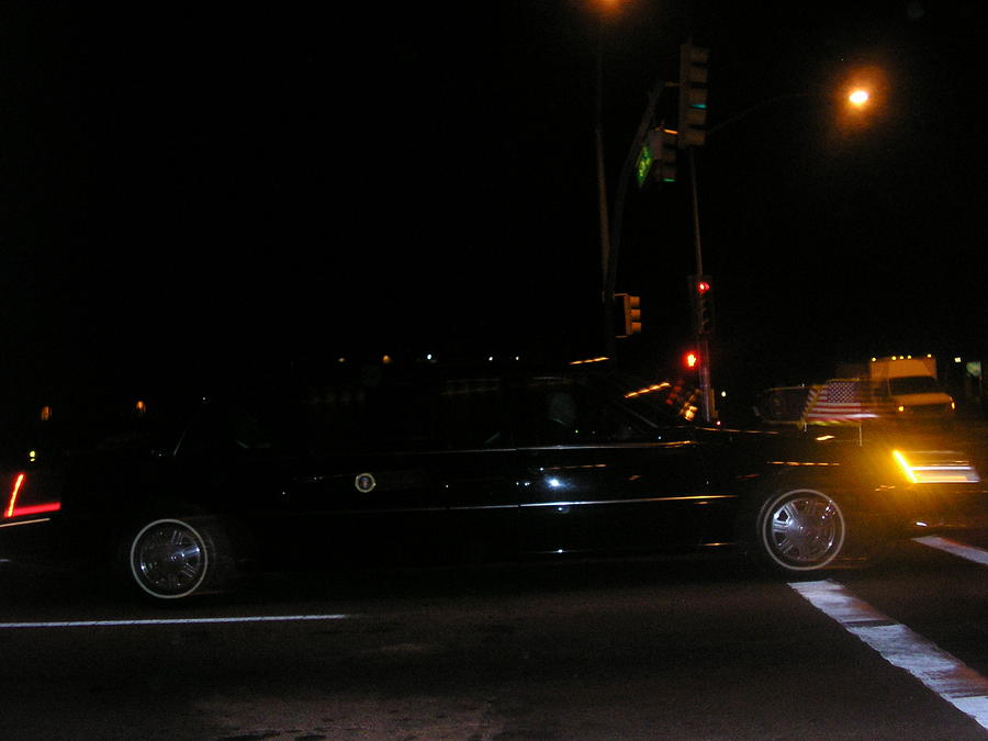 Obamas car leaves Tucson Photograph by Jayne Kerr 
