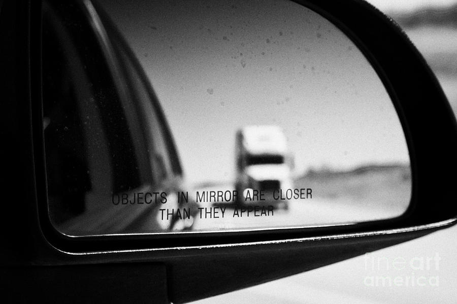 objects in mirror are closer than they appear in car side mirror with truck  on highway Canada Photograph by Joe Fox - Fine Art America