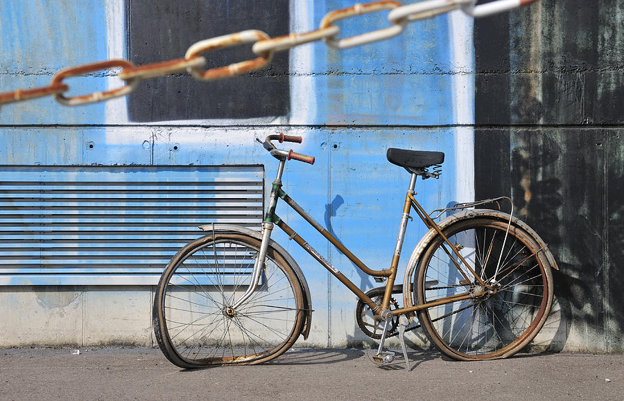 Old and broken bicycle left alone Photograph by Matthias Hauser