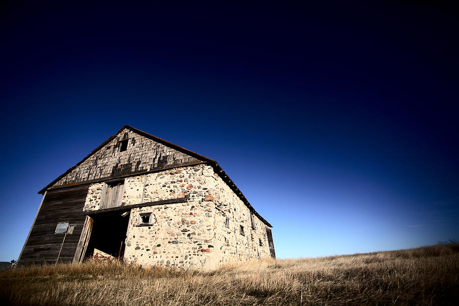 Old barn on the Prairies Photograph by Mark Duffy
