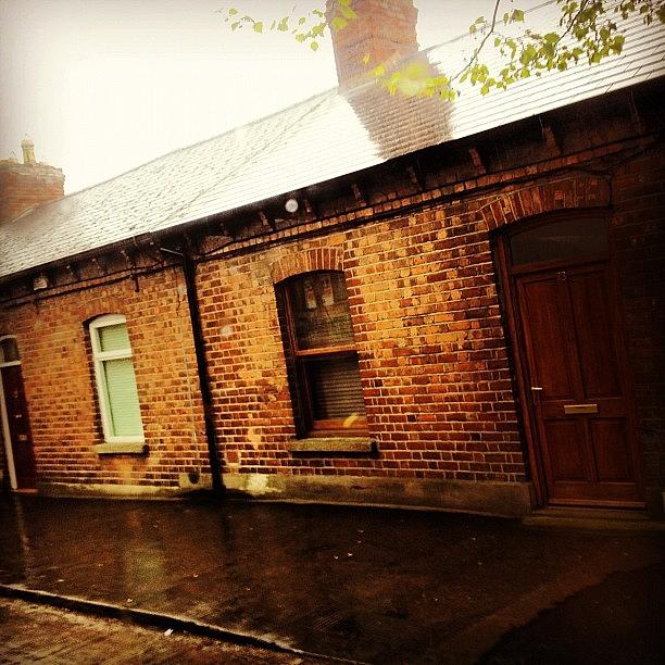 Old Dublin Quarter Under Lashing Rain Photograph by Fotocrat Atelier