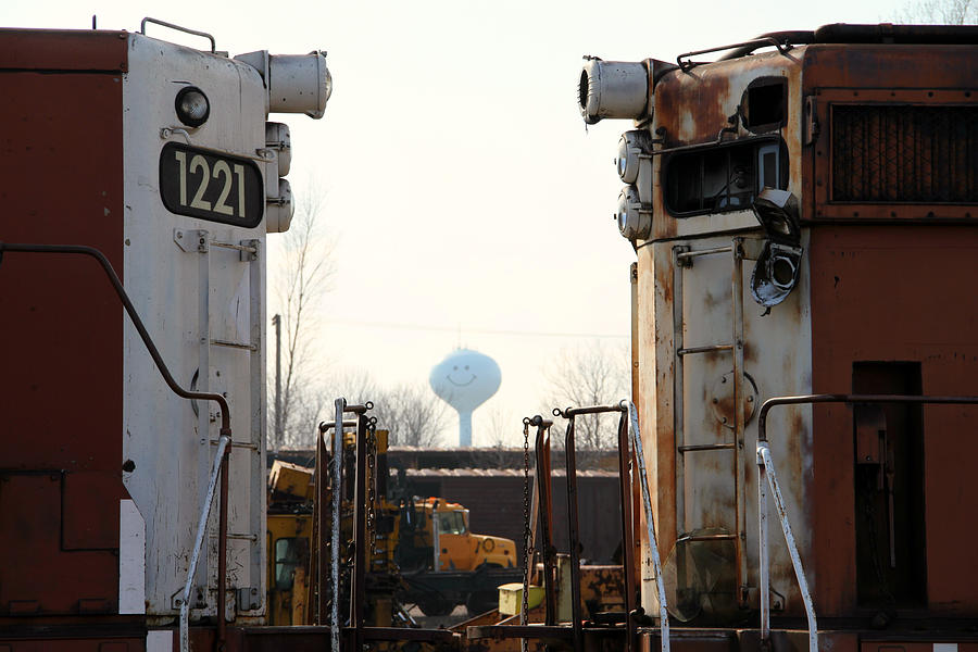 Old Engines and a Smiling Water Tower Photograph by Mark J Seefeldt