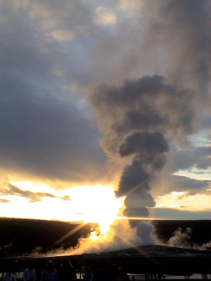 Old Faithful Geyser at Sunset Yellow Stone National Park Photograph by John Shiron