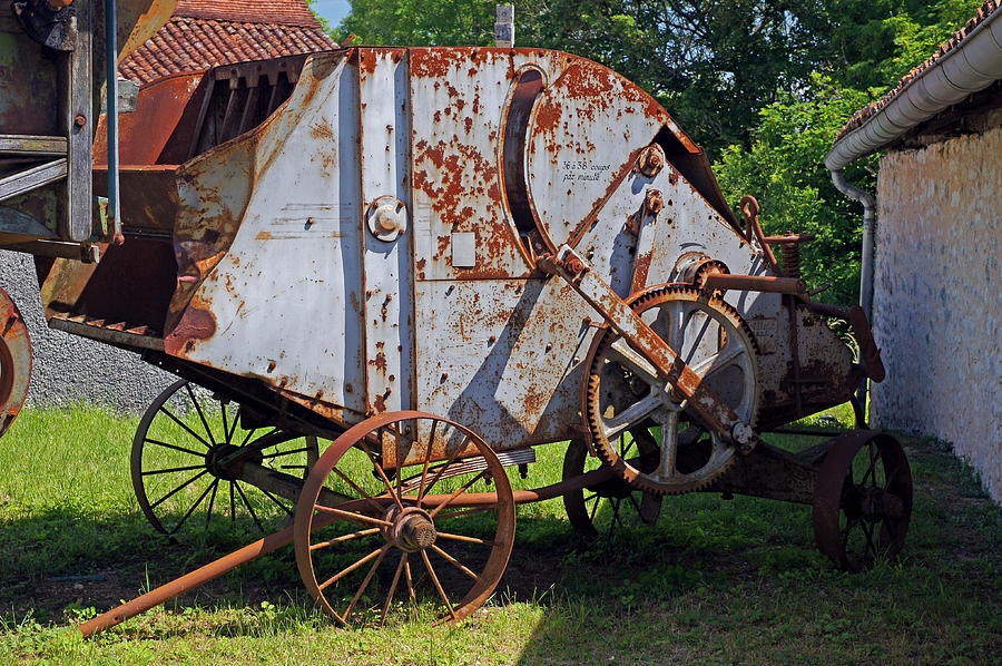 Old farm machine Photograph by Rod Jones