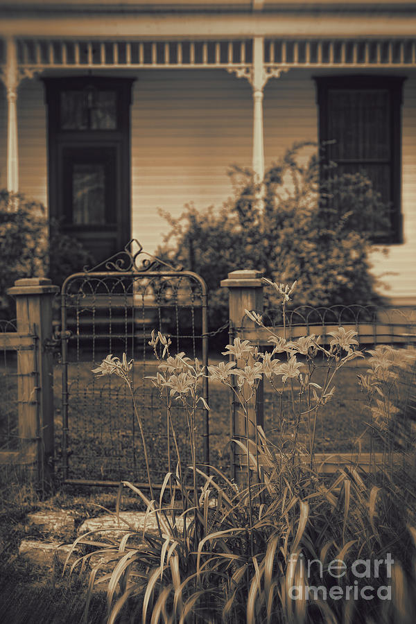 Old fence in front of country house Photograph by Sandra Cunningham