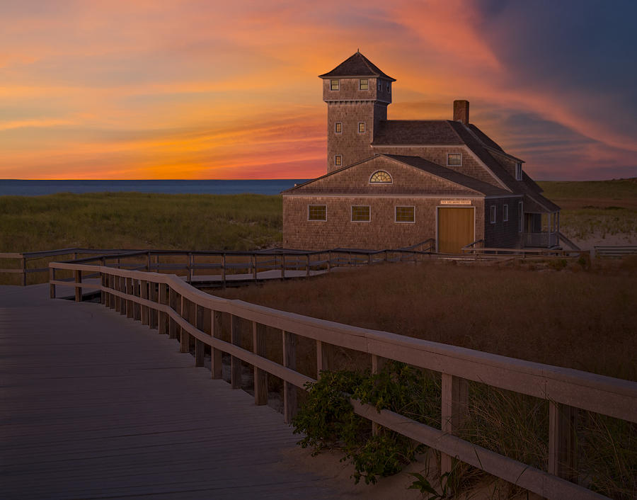Sunset Photograph - Old Harbor U.S. Life Saving Station by Susan Candelario