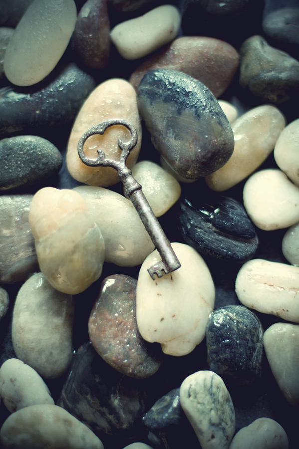 Old Key Lost Among Stones Photograph by Ethiriel Photography