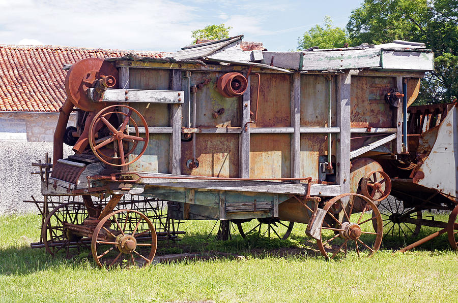 Old threshing machine Photograph by Rod Jones