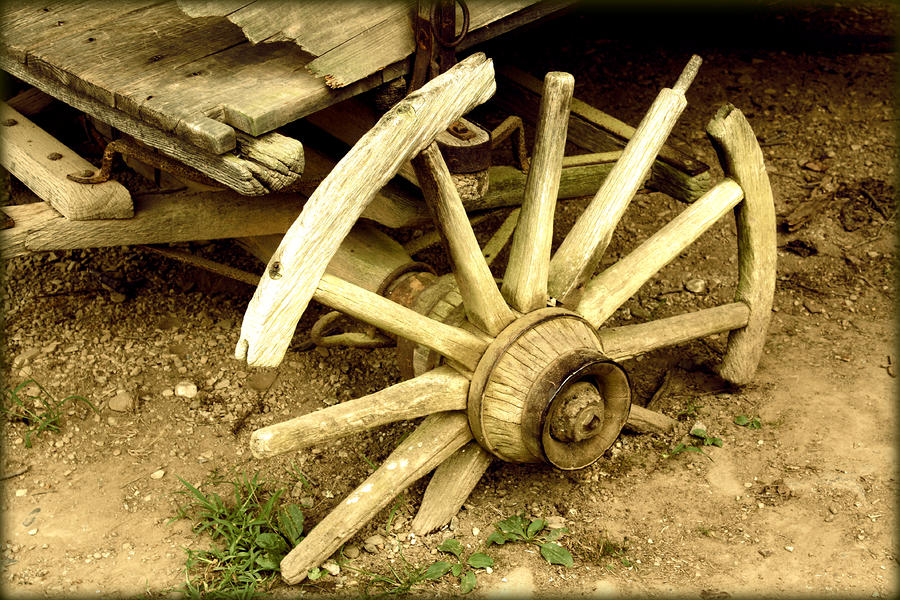 Transportation Photograph - Old Wagon Wheel by Susie Weaver