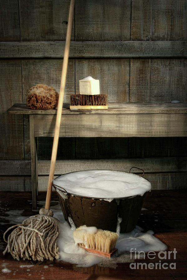 Vintage Photograph - Old wash bucket with mop and brushes by Sandra Cunningham