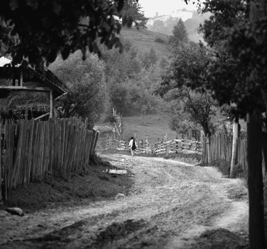 On the village path Photograph by Emanuel Tanjala