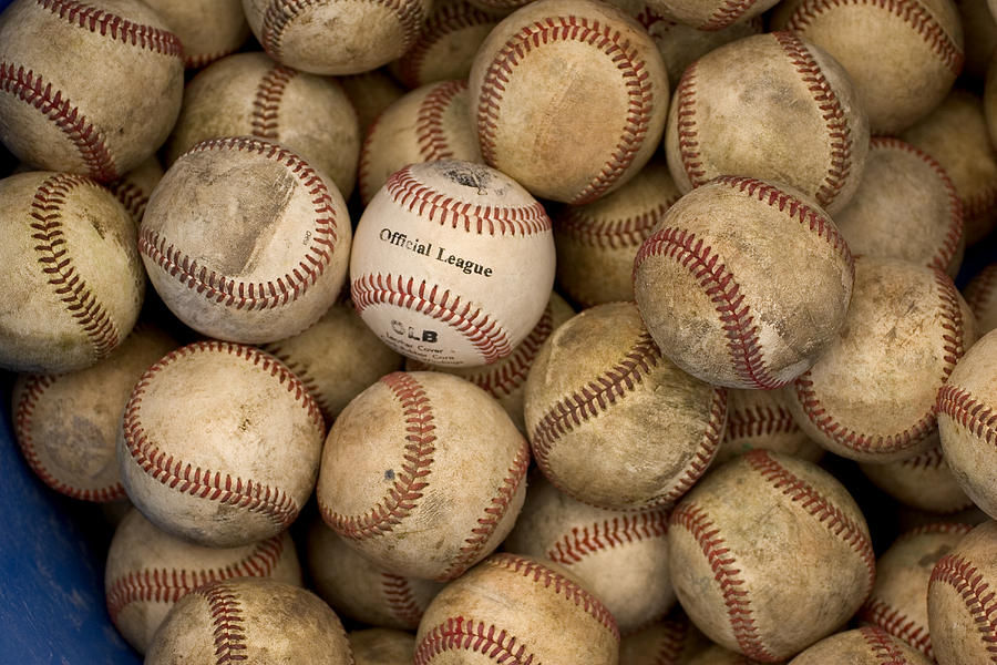 One Clean Baseball Sitting In A Pile by Phil Schermeister