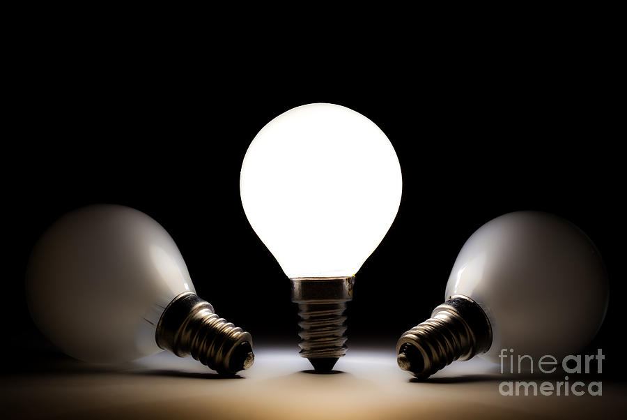One light bulb shining Photograph by Simon Bratt