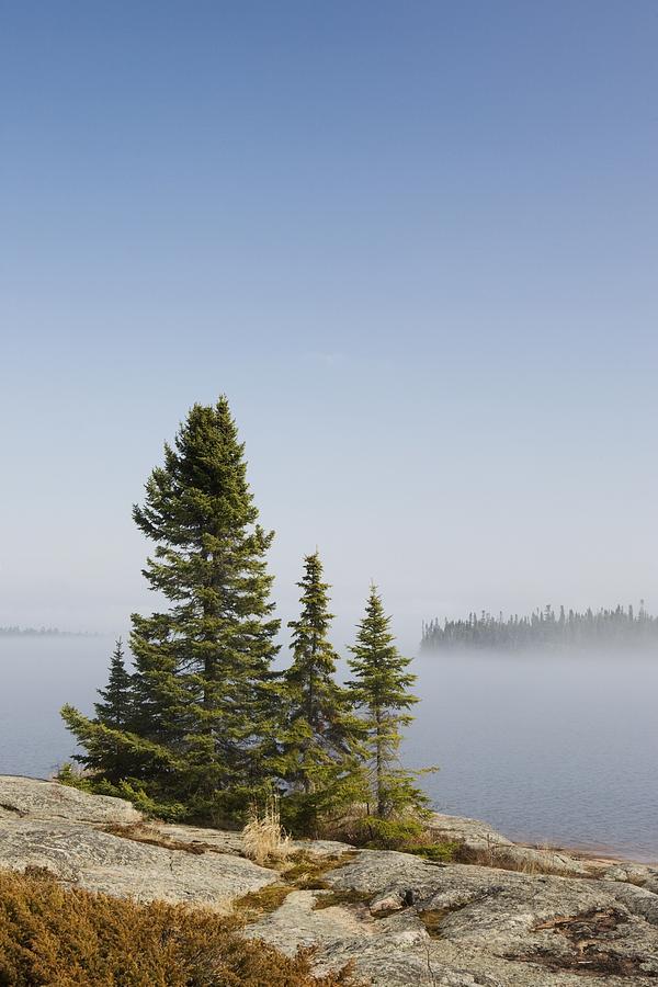 Landscape Photograph - Ontario, Canada An Island And Fog Over by Susan Dykstra