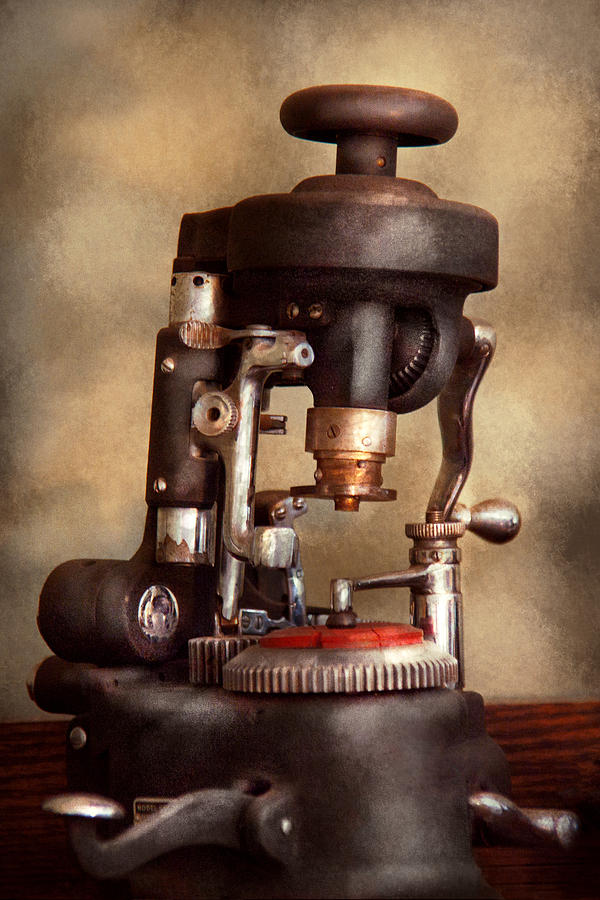 Optometry - Lens cutting machine Photograph by Mike Savad
