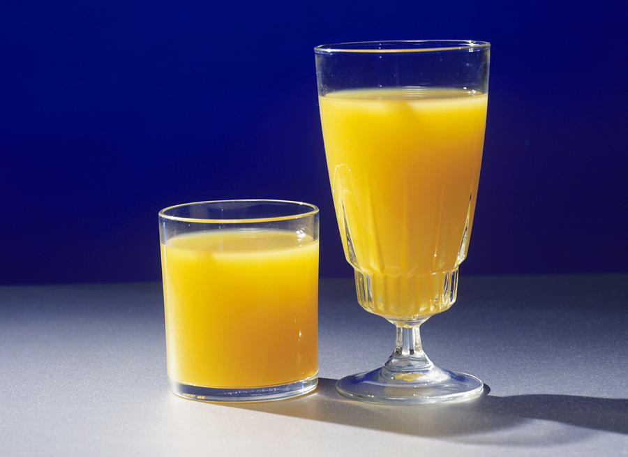 Still Life Photograph - Orange Juice In Two Containers by Andrew Lambert Photography