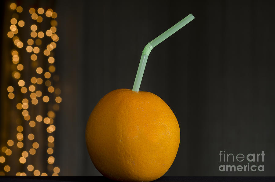 Fruit Photograph - Orange with straw by Mats Silvan