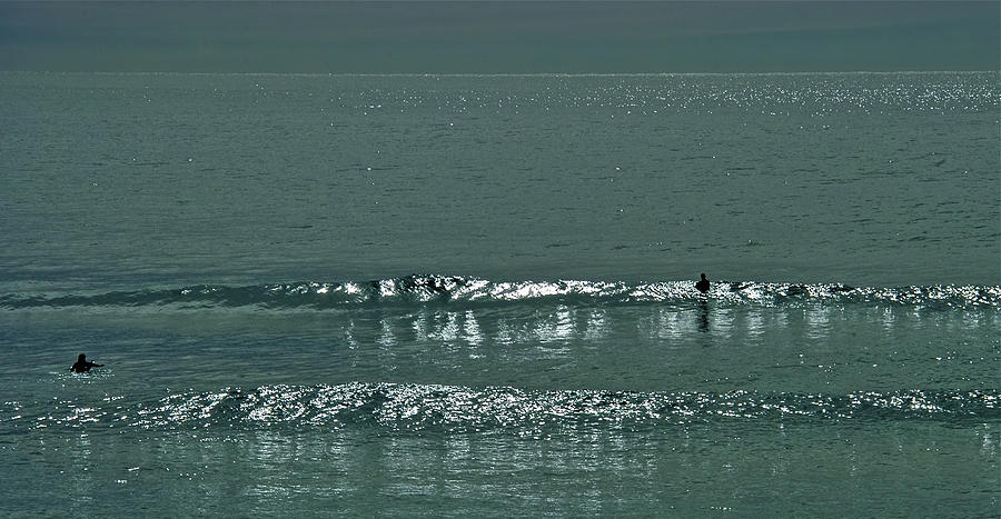 Surf Photograph - Out the back by Jocelyn Kahawai
