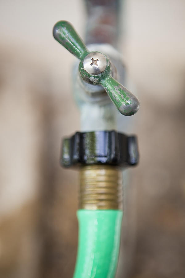 Outdoor Faucet And Hose Photograph By Bryan Mullennix - Fine Art America