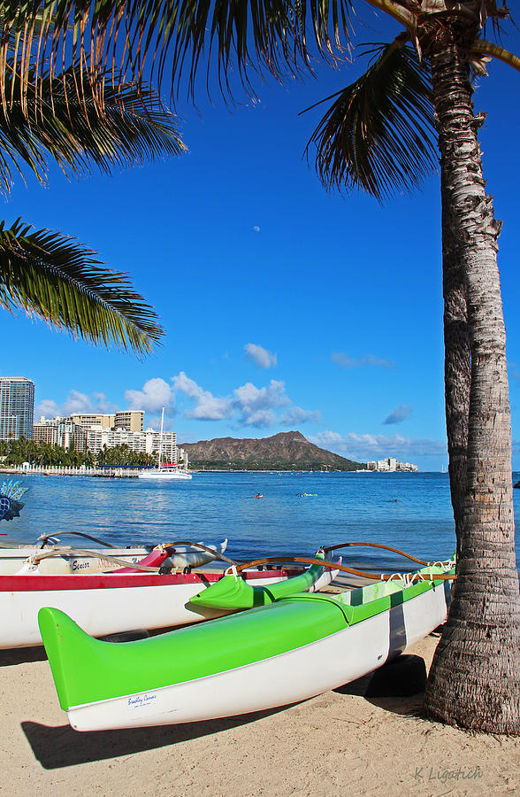 Outrigger Canoes in Waikiki Photograph by Kerri Ligatich
