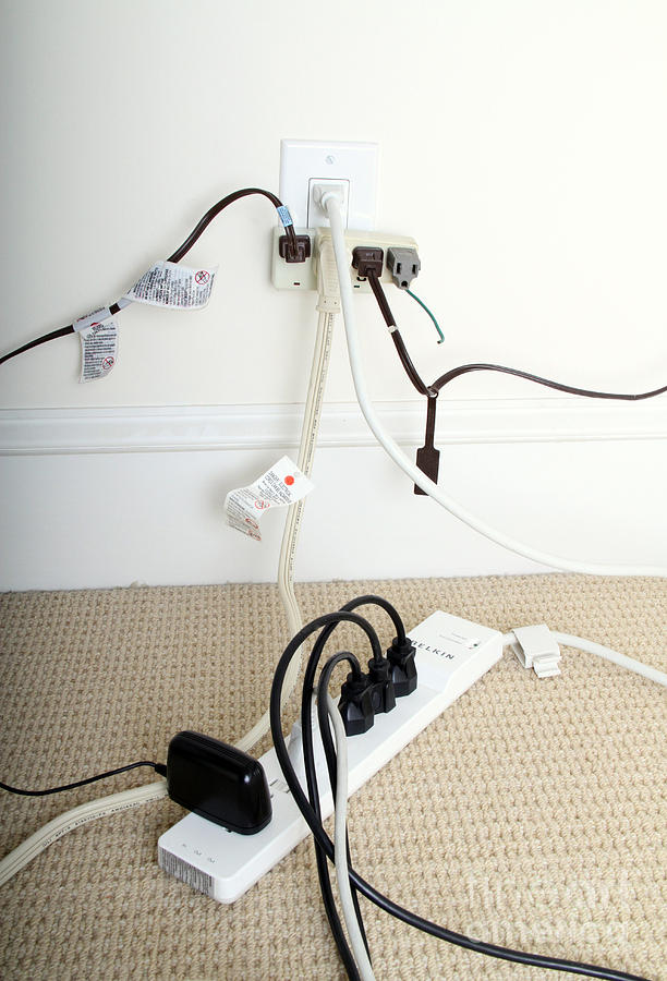 Overloaded Electrical Outlet Photograph by Photo Researchers, Inc.